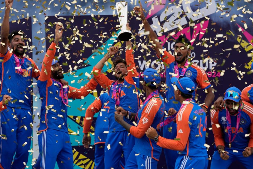 India lift the T20 World Cup trophy as tickertape falls (AP)