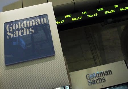 A Goldman Sachs sign is seen over their kiosk on the floor of the New York Stock Exchange, April 26, 2010. REUTERS/Brendan McDermid