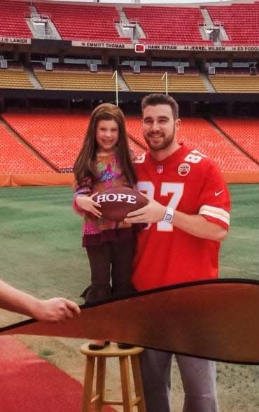 Berkeley Kemper, then 6, and Travis Kelce posed together in April 2014.