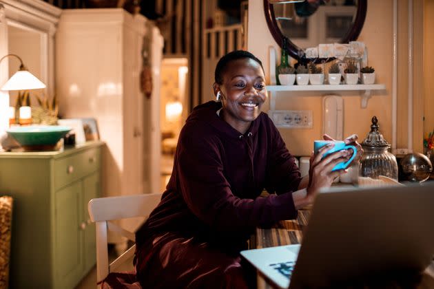 Switching on something funny and mindless can give you a boost. (Photo: Marko Geber via Getty Images)