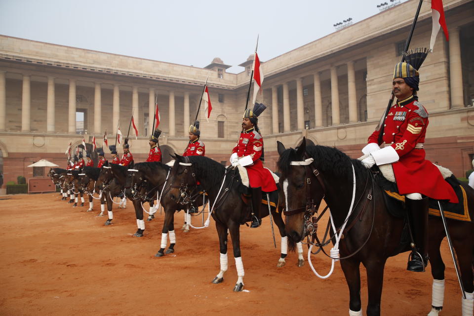 Indian presidential bodyguards wait to welcome U.S. President Donald Trump for a ceremonial welcome at Rashtrapati Bhavan, the presidential palace, in New Delhi, India, Tuesday, Feb. 25, 2020. (AP Photo/Alex Brandon)