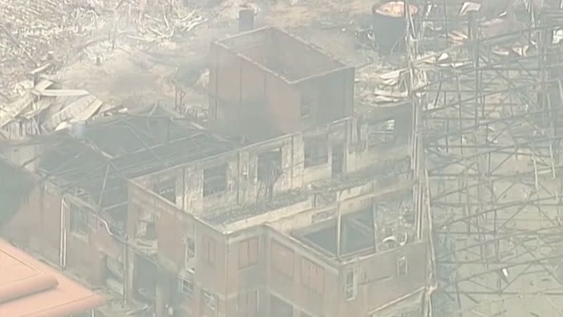 Aerial view of a destroyed three-storey building in Batlow