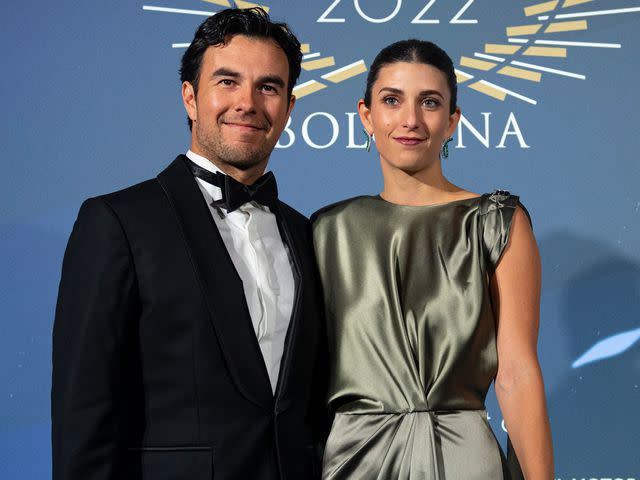 <p>Rudy Carezzevoli - Formula 1/Formula 1/Getty </p> Carola Martinez and Sergio Perez during the FIA Prize Giving at Bologna Fiere on December 9, 2022.