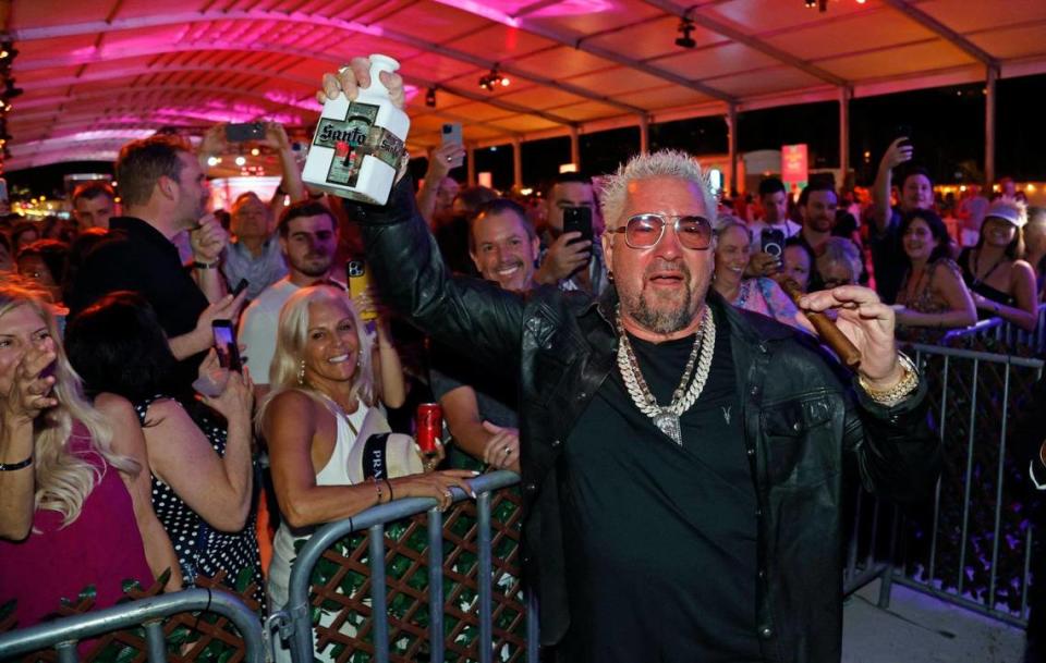 Food Network star Guy Fieri with fans at the 2023 South Beach Wine & Food Festival near the Ritz-Carlton Miami Beach.