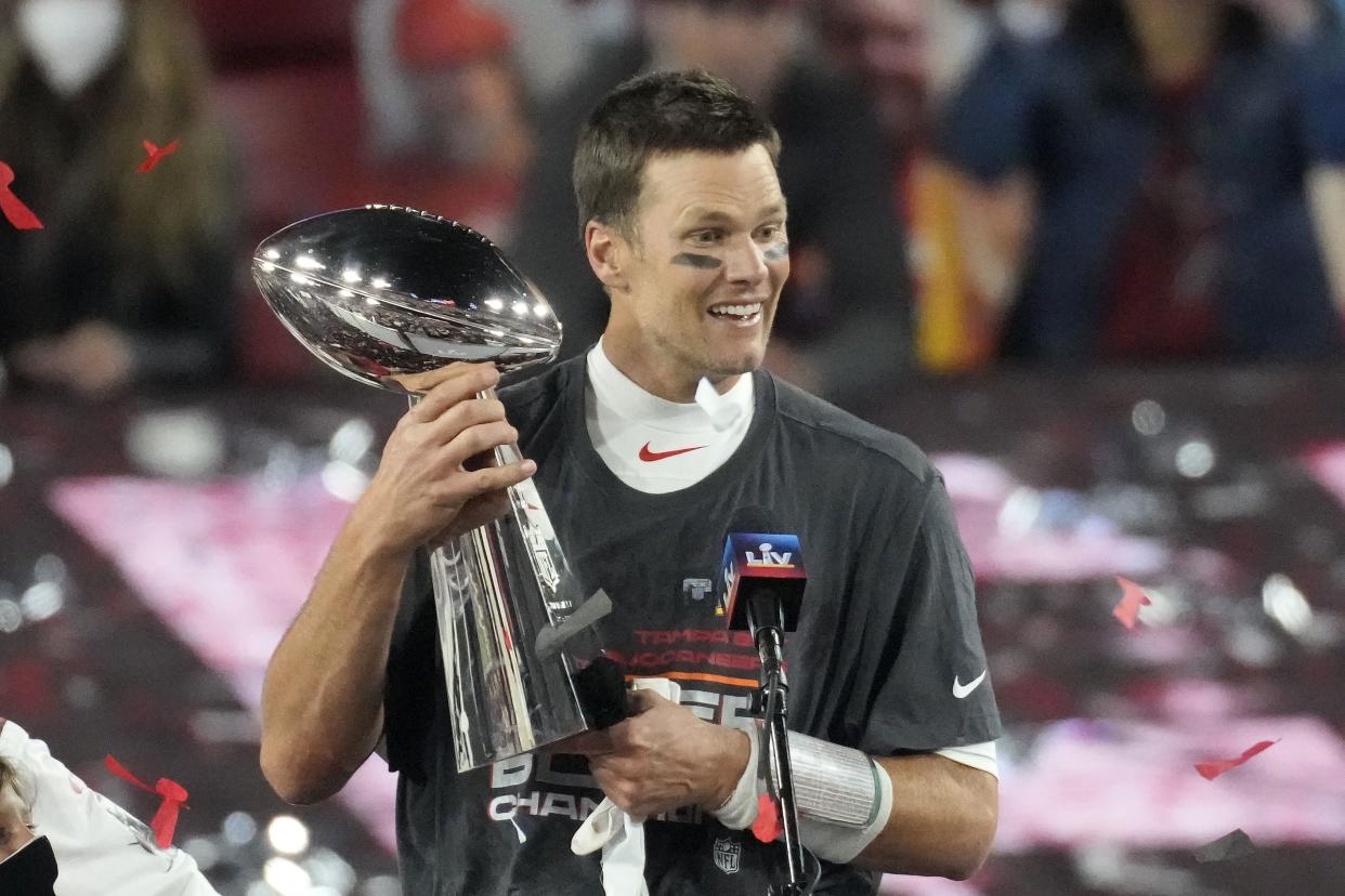 Tampa Bay Buccaneers quarterback Tom Brady celebrates with the Vince Lombardi Trophy after leading the Bucs past the Kansas City Chiefs on Feb. 7 in Tampa, Fla. 