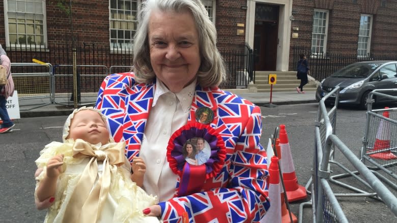 Royal baby super fans clamour outside London hospital