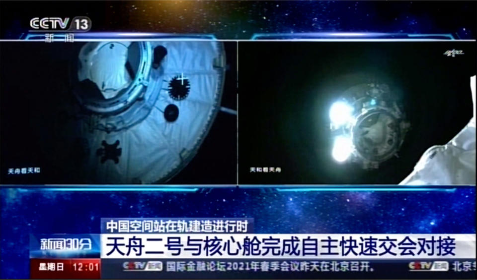 This image made from video footage by China's CCTV shows Tianhe core module's camera footage showing Tianzhou 2 cargo spacecraft approaching on Sunday, May 30, 2021. An automated spacecraft docked with China's new space station Sunday carrying fuel and supplies for its future crew, the Chinese space agency announced. (CCTV via AP Video)