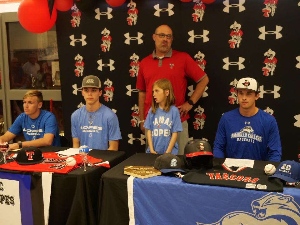 Tascosa's Will Davis (left), Brayden Keeter (center) and Ryan Wingate (right) signed to play college baseball on Monday, May 22, 2023 at Tascosa High School. They were introduced by head coach Jason Patrick (back).