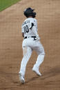 Chicago White Sox's Yoan Moncada runs the bases after hitting a two-run home run during the sixth inning of the team's baseball game against the Chicago Cubs in Chicago, Saturday, Sept. 26, 2020. (AP Photo/Nam Y. Huh)