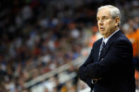 Head coach Eddie Biedenbach of the UNC Asheville Bulldogs looks on during a break in play against the Syracuse Orange in the second round of the 2012 NCAA Men's Basketball Tournament at Consol Energy Center on March 15, 2012 in Pittsburgh, Pennsylvania. (Photo by Jared Wickerham/Getty Images)