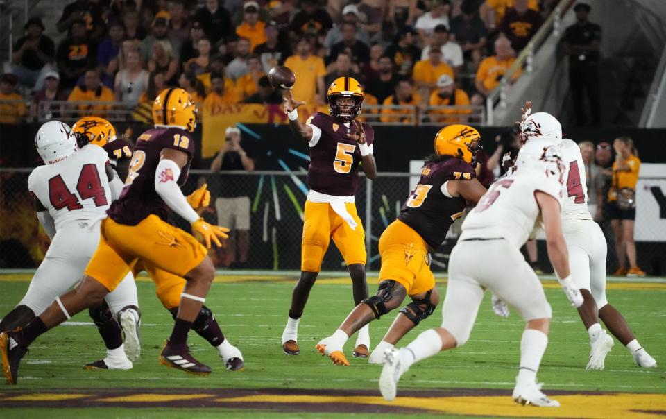 Arizona State Sun Devils quarterback Jaden Rashada (5) throws a pass to tight end Jalin Conyers (12) against the Southern Utah Thunderbirds in the first half at Mountain America Stadium in Tempe on Aug. 31, 2023.