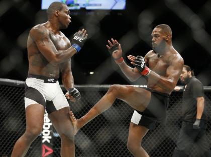 Jon Jones kicks Ovince Saint Preux during their fight at UFC 197. (AP)