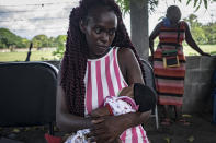 <p>A Garifuna woman and her child. Garifunas are the second largest indigenous group of Honduras. The Afro-Honduran communities that live mainly on the Atlantic coasts and the islands, oppose their forced displacement from traditional lands by tourism and residential development projects, and for this reason among others suffer repression and isolation. (Photo: Francesca Volpi) </p>