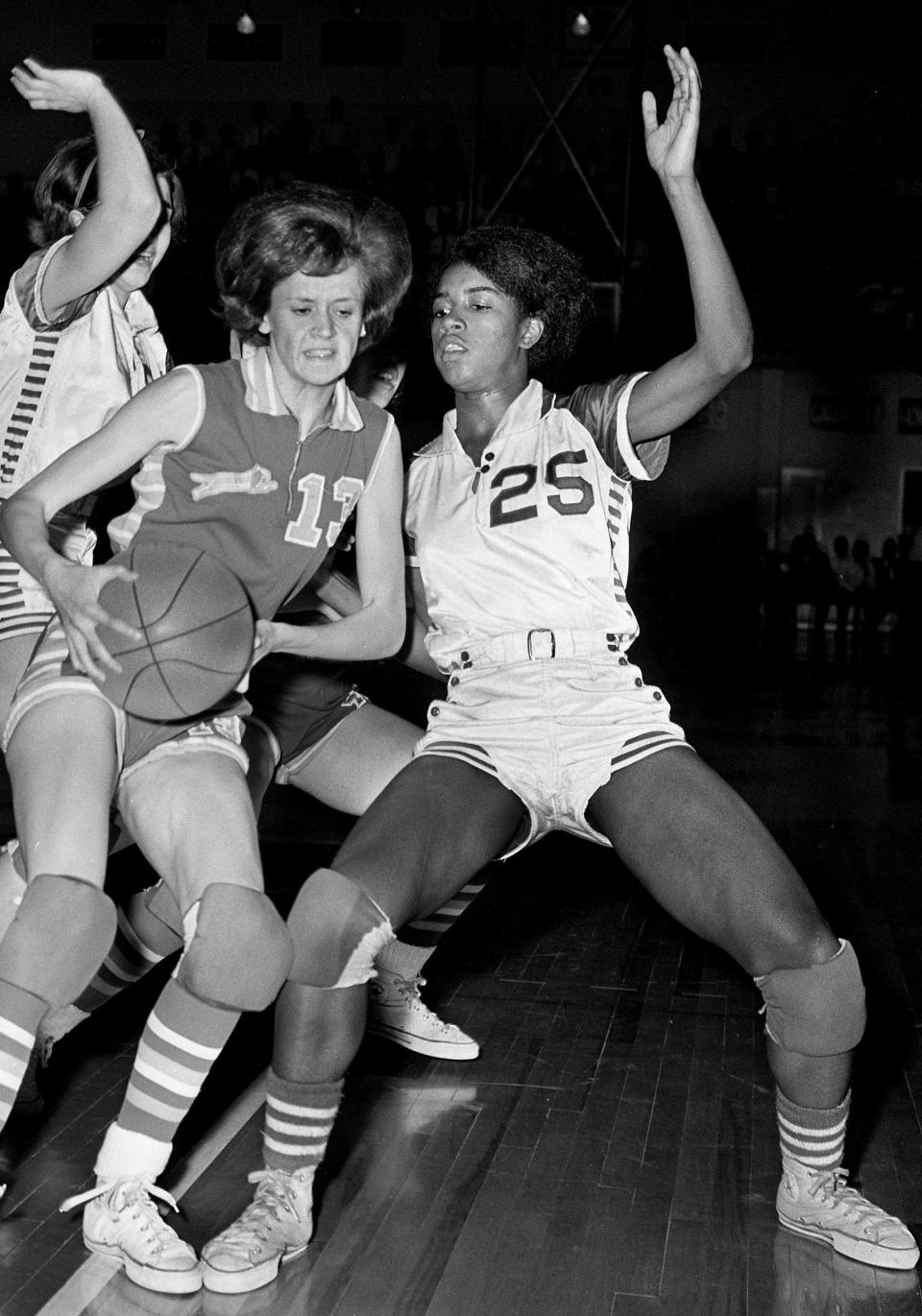 Sally Smith, Waverly High (1965-68): Here, Smith (25), right, defends Porter High guard Gail Webb (13) during the TSSAA State Girls Championship game at Middle Tennessee State gym on March 25, 1967.