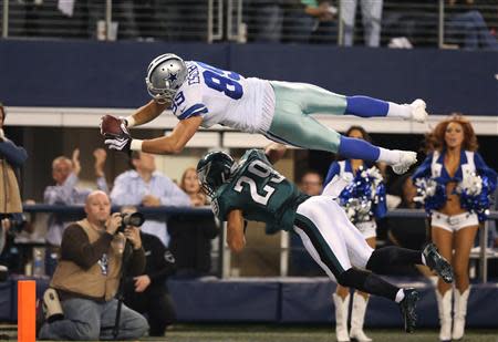 Dec 29, 2013; Arlington, TX, USA; Dallas Cowboys tight end Gavin Escobar (89) dives for the end zone in the second quarter against Philadelphia Eagles safety Nate Allen (29) at AT&T Stadium. Mandatory Credit: Matthew Emmons-USA TODAY Sports