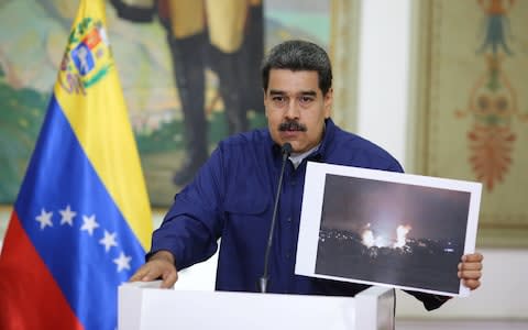 Venezuela's President Nicolas Maduro speaks during a broadcast at Miraflores Palace - Credit: Reuters