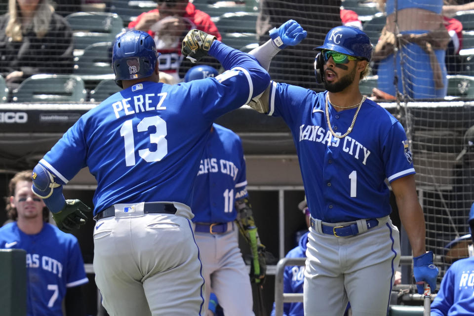 Kansas City Royals' Salvador Perez, left, celebrates with MJ Melendez after hitting a solo home run during the first inning of a baseball game against the Chicago White Sox in Chicago, Saturday, May 20, 2023. (AP Photo/Nam Y. Huh)