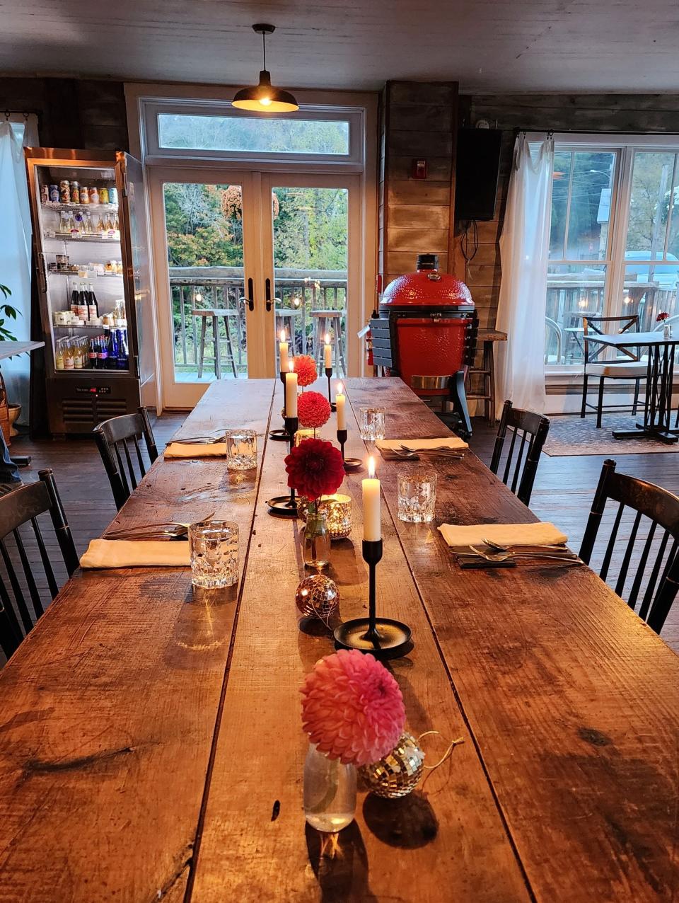 The dining table is rustic and cozy at the Black Goat Test Kitchen and Supperclub.