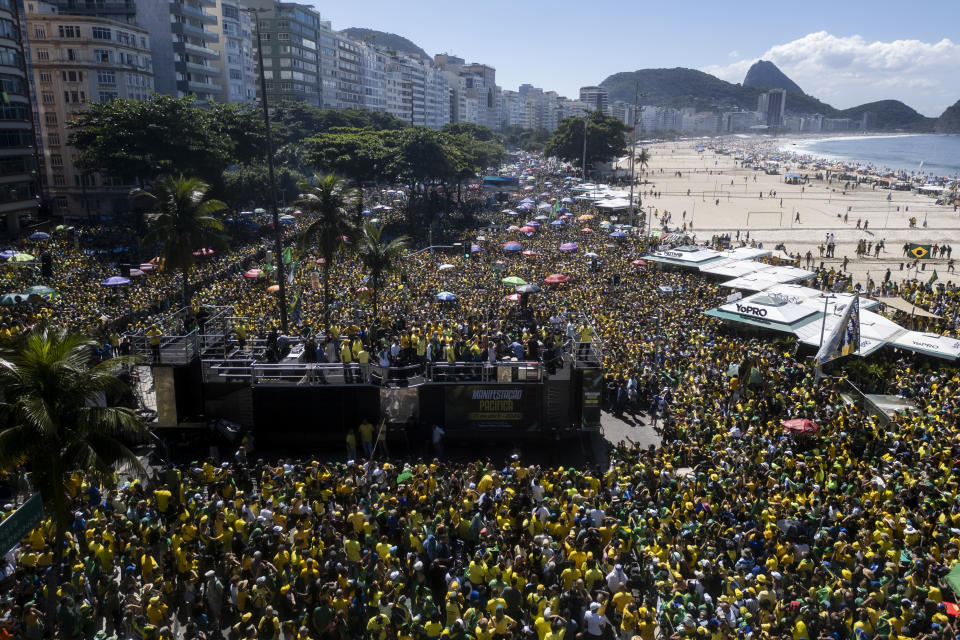 Brazil's former President Jair Bolsonaro speaks during a demonstration calling for freedom of expression, spurred by Brazilian court orders to suspend accounts on the social media platform X, in Copacabana beach, Rio de Janeiro, Brazil, Sunday, April 21, 2024. (AP Photo/Bruna Prado)