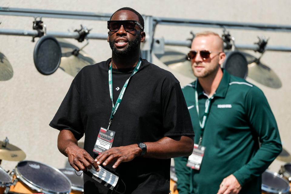 Former Michigan State basketball player Draymond Green on the sideline during the first half against Youngstown State at Spartan Stadium in East Lansing on Saturday, Sept. 11, 2021.
