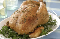 <p>This recipe for roast chicken is made for the holiday season — even Thanksgiving if you’re not a turkey person. The homemade stuffing is easy and full of herby, buttery flavor. </p> <p><a href="https://www.thedailymeal.com/recipes/holiday-roast-chicken-and-stuffing-recipe?referrer=yahoo&category=beauty_food&include_utm=1&utm_medium=referral&utm_source=yahoo&utm_campaign=feed" rel="nofollow noopener" target="_blank" data-ylk="slk:For the Holiday Roast Chicken and Stuffing recipe, click here.;elm:context_link;itc:0;sec:content-canvas" class="link ">For the Holiday Roast Chicken and Stuffing recipe, click here. </a></p>