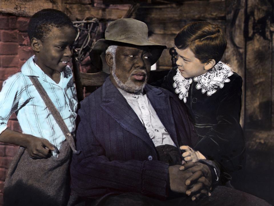 Still of Uncle Remus and Johnny from Song of the South by Disney