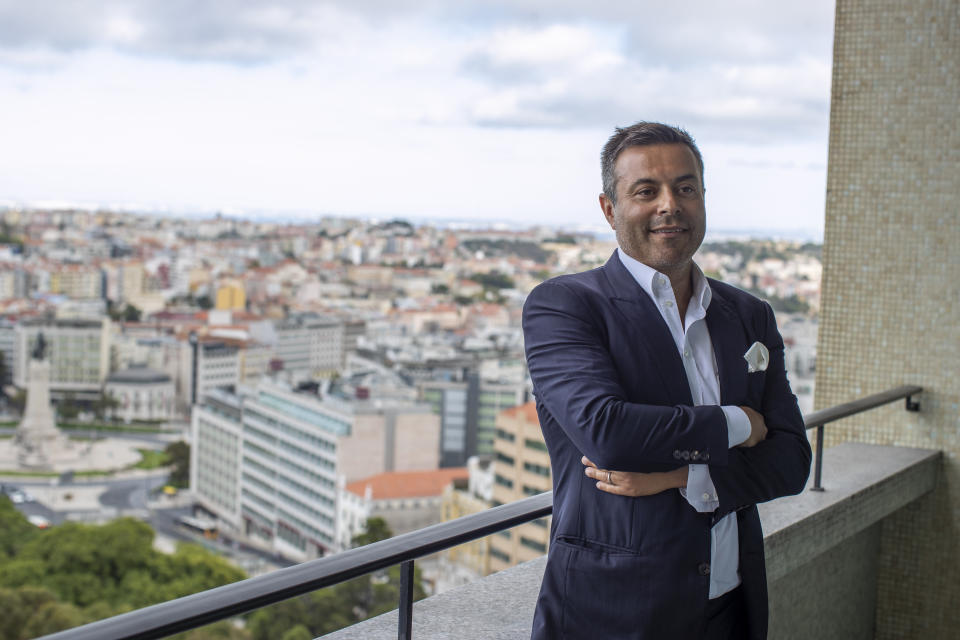 In this photo taken on Wednesday, Aug. 19, 2020, Leeds owner Andrea Radrizzani poses for a picture after an interview with the Associated Press in Lisbon, Portugal. Leeds is counting on Marcelo Bielsa leading the team in the Premier League while planning for a future without the enigmatic manager. In his second season in charge, the Argentine ended the team’s 16-year exile from the world’s richest league by gaining promotion as Championship winners before his contract expired last month. (AP Photo/Manu Fernandez)