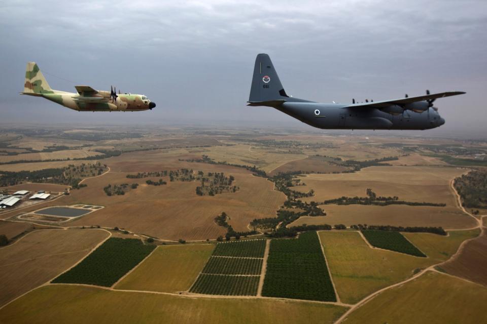 C-130 Hercules (L) and C-130J Super Hercules (R) planes.