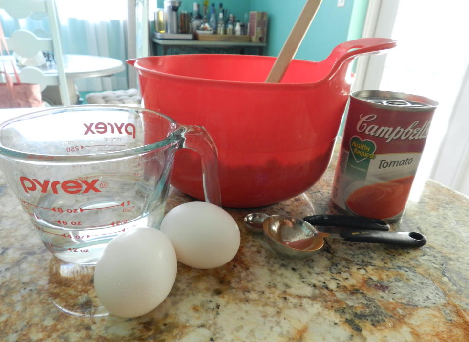 In addition to a box of spice cake mix and a can of Campbell's tomato soup, water and eggs get mixed into the cake batter. (Terri Peters)