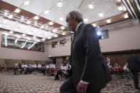 Secretary-General of the United Nations Antonio Guterres arrives at the Japan National Press Club in Tokyo, Monday, Aug. 8, 2022. Guterres urged countries with nuclear weapons to stick to their no-first-use commitment of their atomic arsenals, warning that the nuclear arms race has returned amid growing international tension. (AP Photo/Eugene Hoshiko)