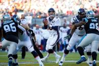 Denver Broncos' quarterback Peyton Manning drops back to pass during the first quarter. REUTERS/Mike Blake