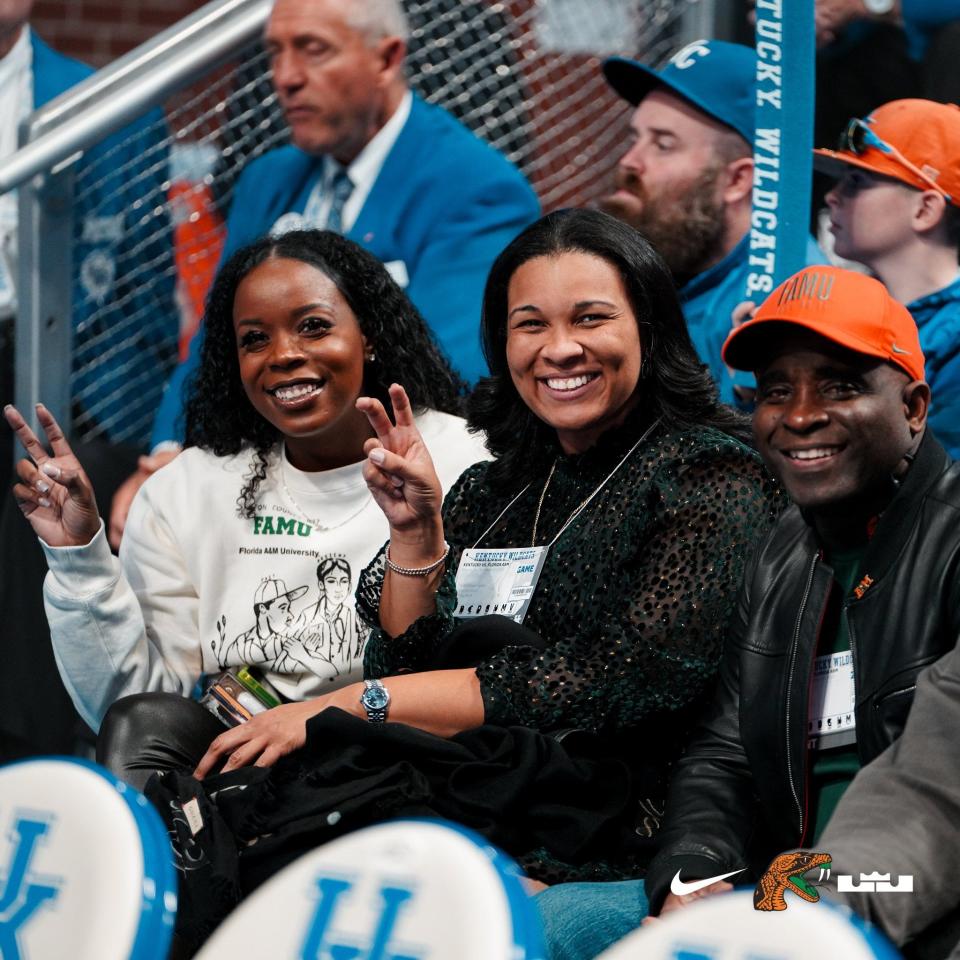 Florida A&M University director of special projects and marketing Ria Floyd (left), vice president and director of athletics Tiffani-Dawn Sykes (middle), and interim director of athletics Michael Smith (right) poses for photo at the Rattlers men’s basketball game against Kentucky at Rupp Arena, Lexington, Kentucky, Wednesday, Dec. 21, 2022