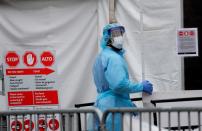 Healthcare worker enters Brooklyn Hospital Center during the coronavirus disease (COVID-19) in New York