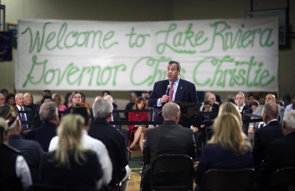 New Jersey Gov. Chris Christie addresses a gathering during a town hall meeting at Lake Riviera Middle School in Brick Township, N.J., Thursday, April 24, 2014. (AP Photo/Mel Evans)