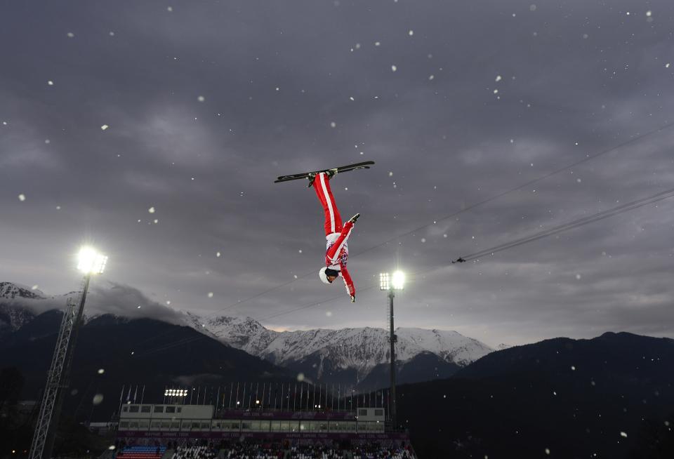 Mischa Gasser flies high over PyeongChang while below his father watches. (Getty)