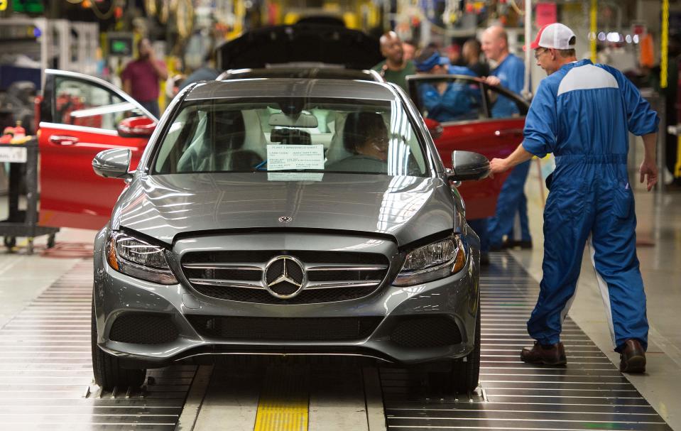 In this file photo taken on June 8, 2017 Employees inspect Mercedes-Benz C-Class cars at the Mercedes-Benz US International factory in Vance, Alabama. - A US Commerce Department report has concluded that American auto imports threaten national security, setting the stage for possible tariffs by the White House, two people familiar with the matter said February 14, 2019. The investigation, ordered by President Donald Trump in May, is "positive" with respect to the central question of whether the imports "impair" US national security, said a European auto industry source.