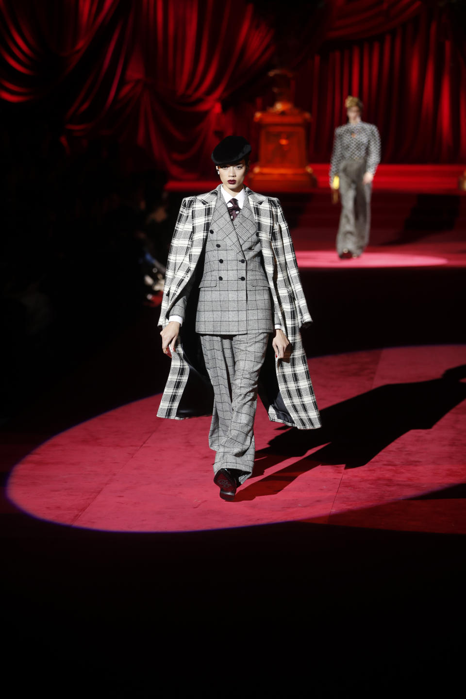 A model wears a creation as part of the Dolce & Gabbana women's Fall-Winter 2019-2020 collection, that was presented in Milan, Italy, Sunday, Feb. 24, 2019. (AP Photo/Antonio Calanni)