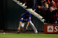 ST LOUIS, MO - OCTOBER 19: Nelson Cruz #17 of the Texas Rangers misses the fly ball hit by Allen Craig #21 of the St. Louis Cardinals, scoring David Freese #23 in the bottom of the sixth inning during Game One of the MLB World Series at Busch Stadium on October 19, 2011 in St Louis, Missouri. (Photo by Rob Carr/Getty Images)