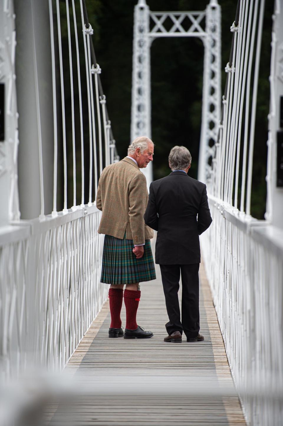 Charles with bridges manager, Donald Macpherson (Wullie Marr/DCT Media/PA) (PA Wire)