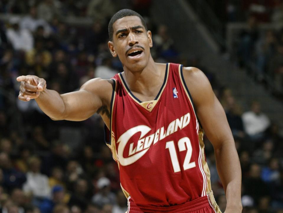 Kevin Ollie points during a game in 2003.