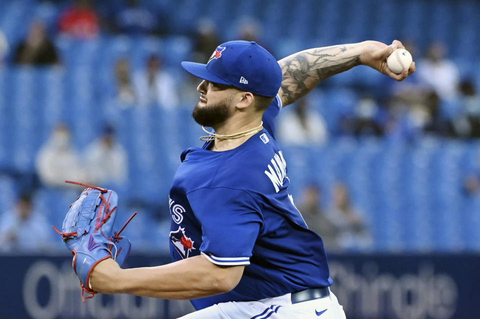 Toronto Blue Jays' Alek Manoah pitches in the first inning of a baseball game against the Tampa Bay Rays in Toronto on Monday, Sept. 13, 2021. (Jon Blacker/The Canadian Press via AP)