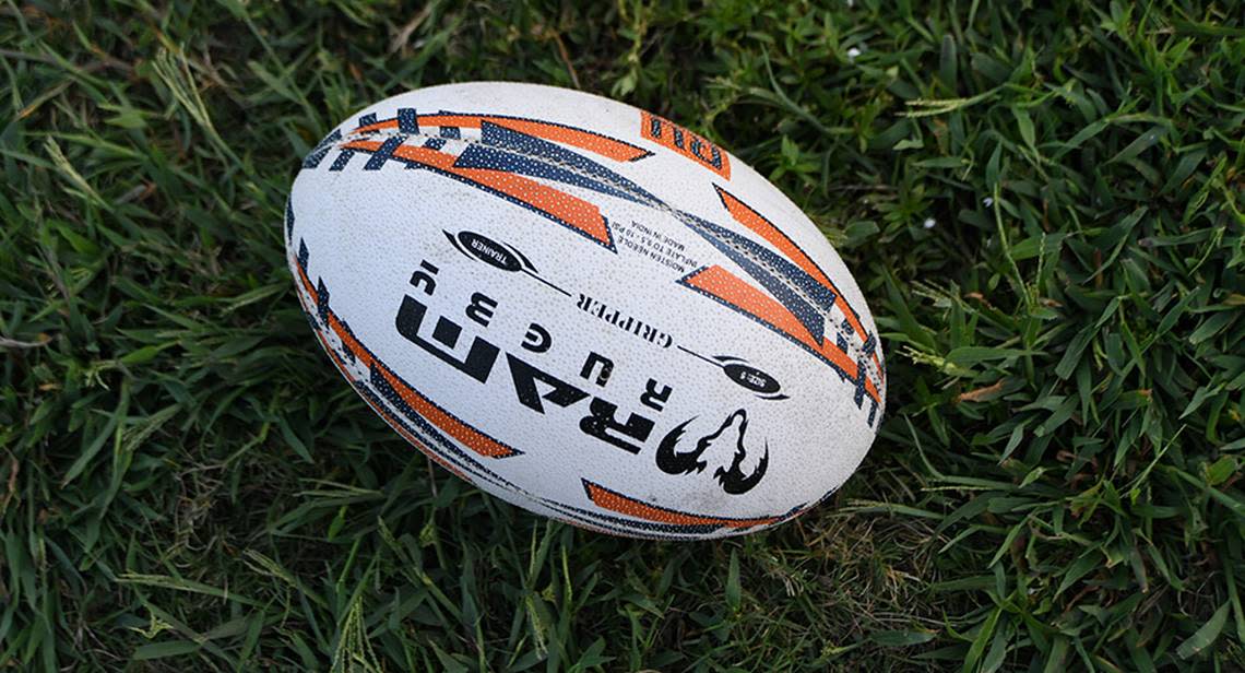 A rugby ball bears several similarities to the one used in the NFL but the differences are what distinguish the two games. The rugby ball is wider and has two stubby ends compared to the more pointed ends of an American football. The rugby ball is designed for shorter, underhanded throws and is more apt to go end-over-end where the American football is designed to be thrown with one hand, overhead and can reach distances of 70 yards. Robert York