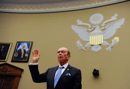 U.S. Commerce Secretary Wilbur Ross is sworn in before a House Oversight and Reform Committee hearing on oversight of the Commerce Department, in Washington, U.S., March 14, 2019. REUTERS/Mary F. Calvert