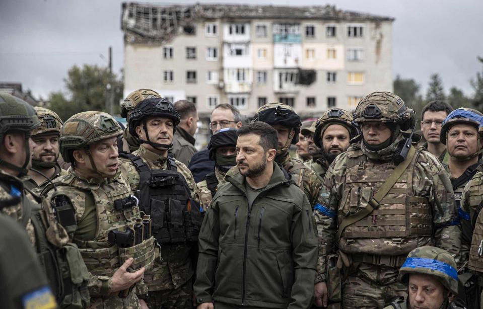 Ukrainian President Volodymyr Zelensky attends a flag hoisting ceremony in Izyum after the Ukrainian forces took back control of the city from the Russians.<span class="copyright">Metin Aktas–Anadolu Agency/Getty Images</span>