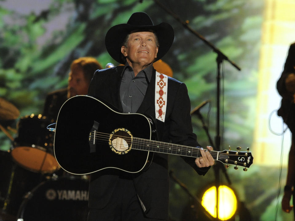 FILE - In this April 7, 2013 file photo, singer George Strait performs at the 48th Annual Academy of Country Music Awards at the MGM Grand Garden Arena in Las Vegas. The 2014 Academy of Country Music Awards in Las Vegas will air live Sunday night, April 6, 2014, from 8-11 p.m. EDT on CBS. Several awards, including top honor entertainer of the year, will be announced during the broadcast, to be hosted by Blake Shelton and Luke Bryan. Shelton, Bryan, George Strait, Miranda Lambert, Jason Aldean, Keith Urban, Tim McGraw, Shakira and Stevie Nicks are scheduled to perform. (Photo by Chris Pizzello/Invision/AP, file)