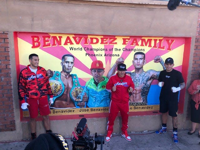 The Benavidez family in front of their mural at Central Boxing Gym. Right to left, Jose Jr. , Jose Sr., David Benavidez.
