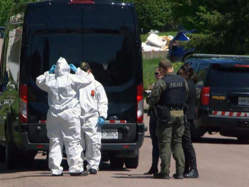 Provincial police are seen at the scene of a double-homicide in Pembroke, Ont. Two people were killed and another suffered critical injuries in connection with the incident on Mackay Street on May 22, 2023, according to OPP. (Nick Persaud/CBC - image credit)