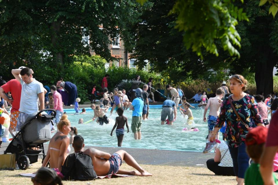 Londoners bask in Clissold Park, north London (PA)