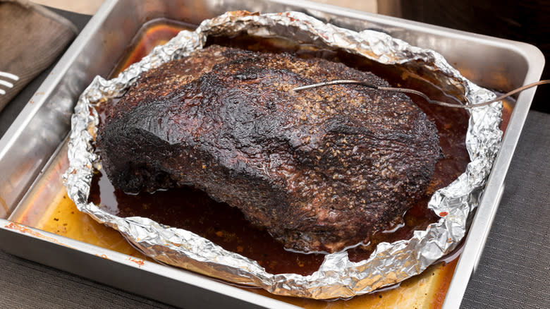 Cooking brisket in a pan 