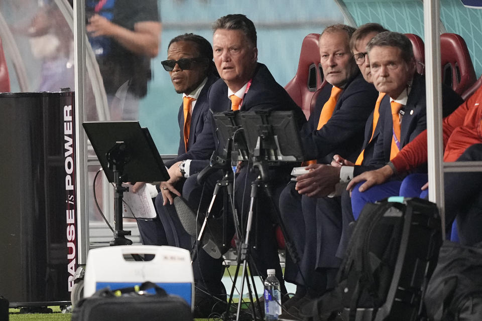 Head coach Louis van Gaal of the Netherlands of the Netherlands, second left, watches his team during the World Cup group A soccer match between the Netherlands and Ecuador, at the Khalifa International Stadium in Doha, Qatar, Friday, Nov. 25, 2022. (AP Photo/Martin Meissner)